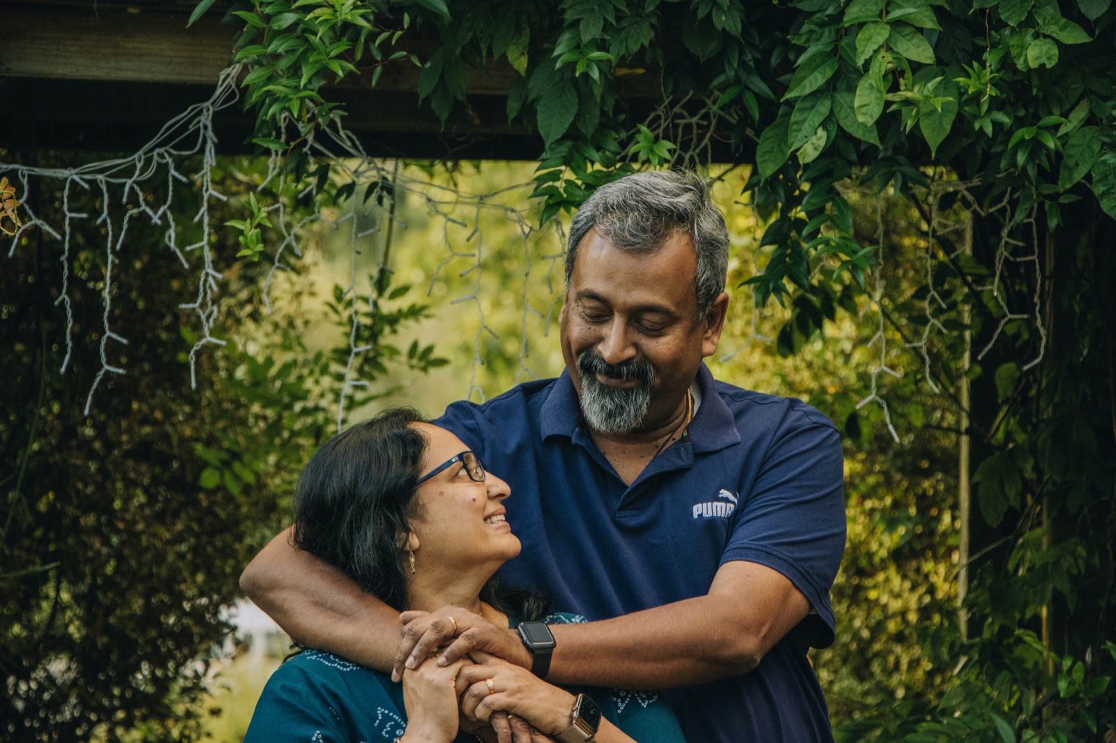 A couple embracing in a garden